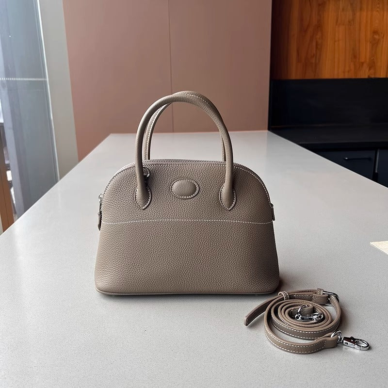 新款荔枝纹真皮贝壳包头层牛皮保龄球手提包拉链大容量通勤女包