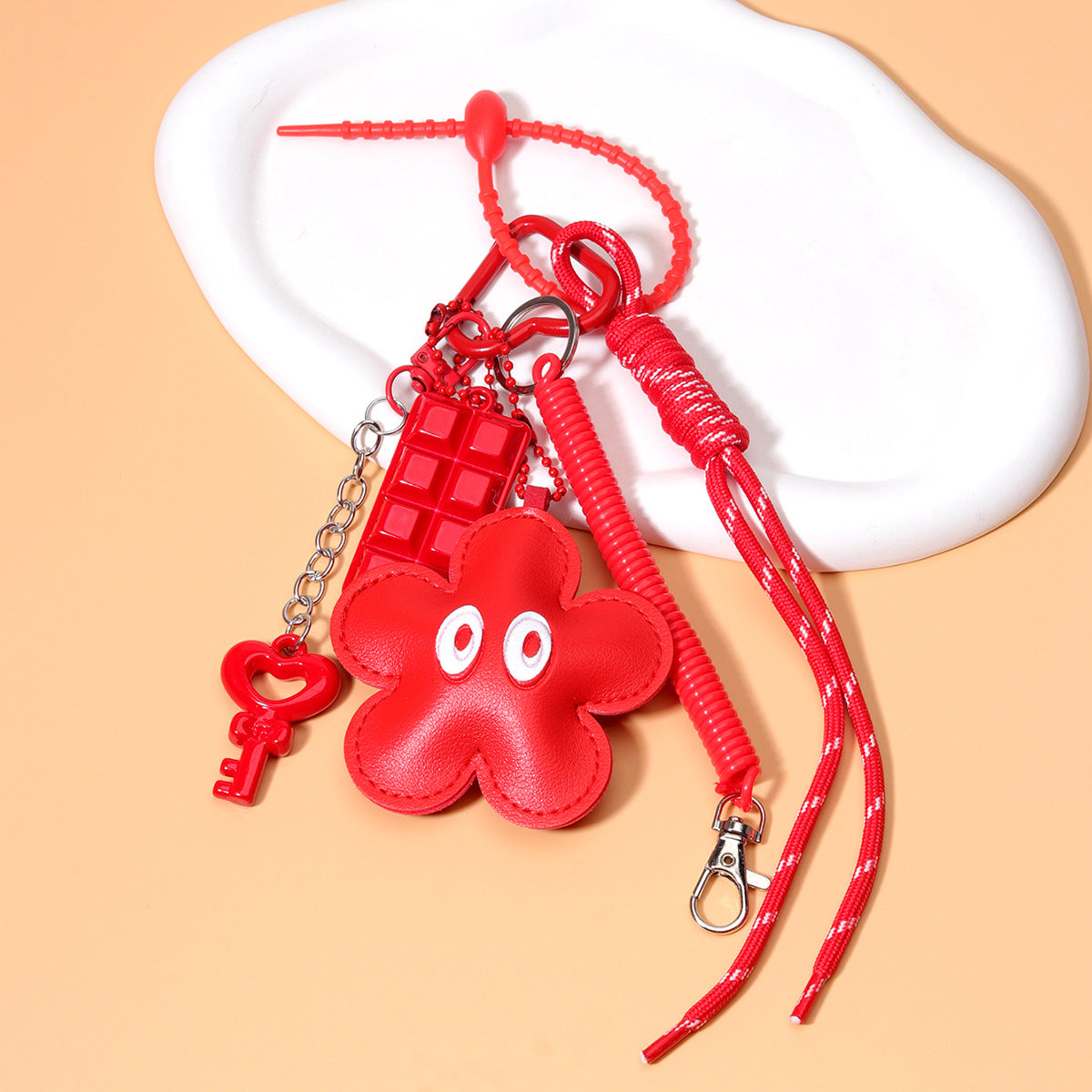 工厂原创diy包包挂件PU皮革豹纹小花挂件亚克力手提包串珠编织绳