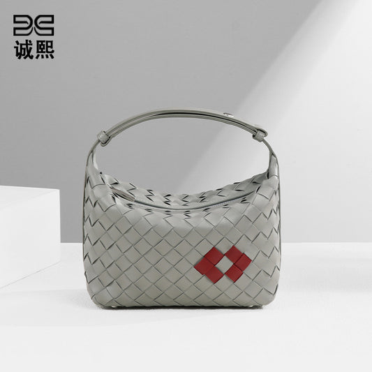 个性潮流简约手拎饭盒包新款红唇夏季单肩包手工编织包包腋下女包
