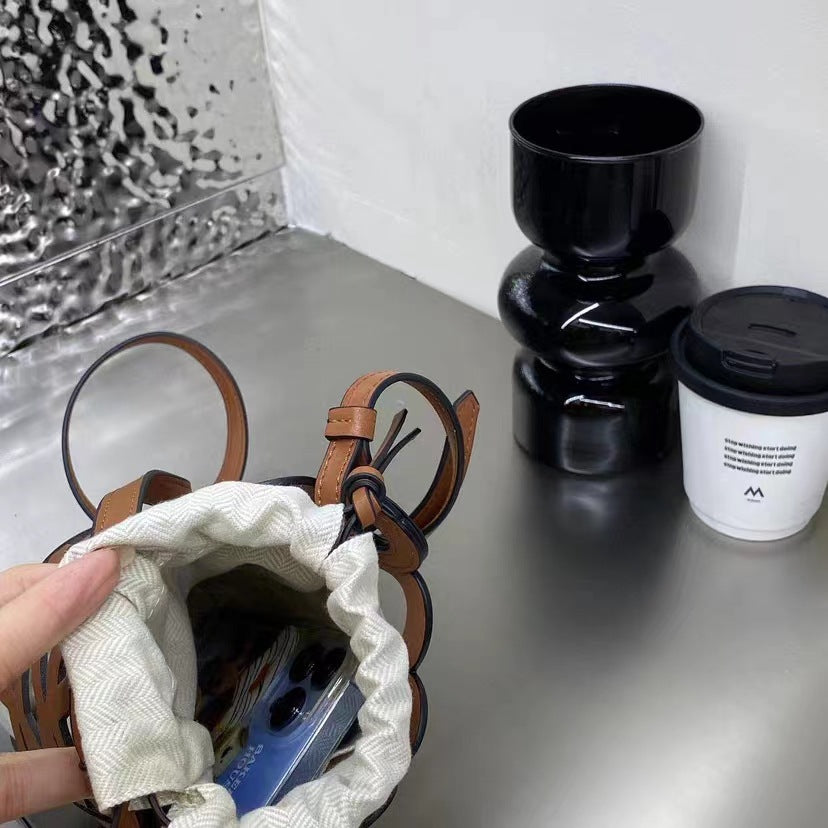 欧货品质女包2023新款水桶包复古文艺牛皮镂空个性单肩斜挎包包