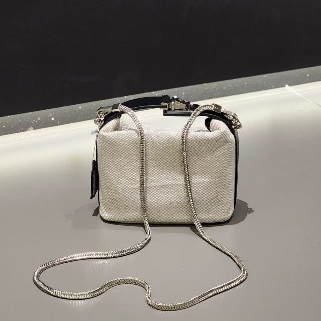 牛皮拼接牛仔布帆布手提饭盒包链条饺子包时尚百搭单肩斜挎小包女