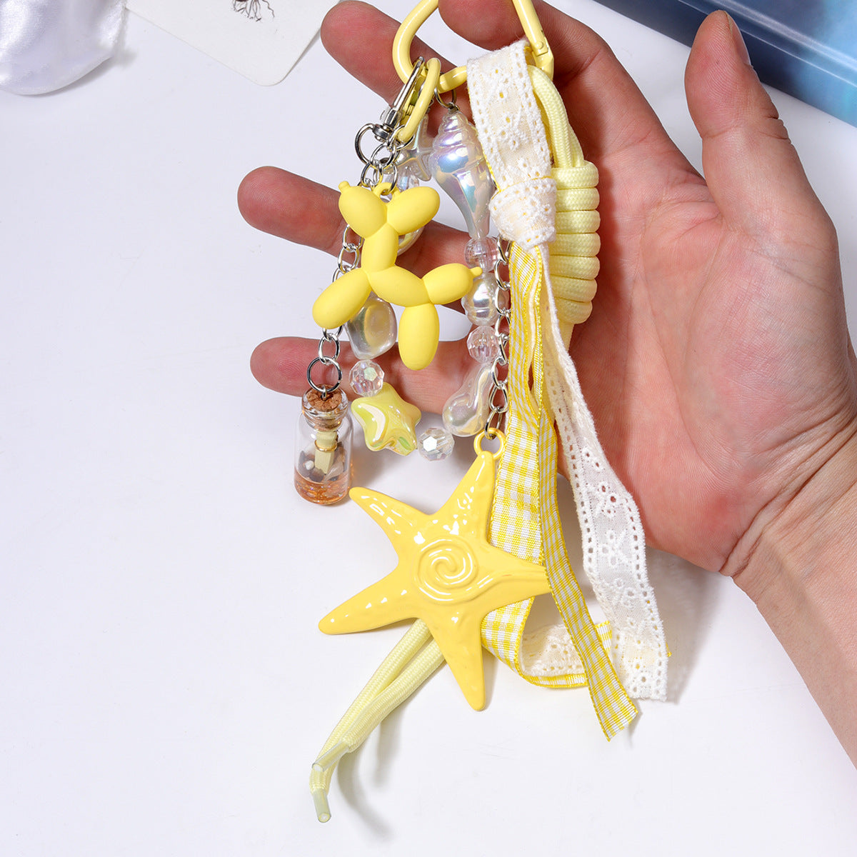 跨境货源义乌现货diy包包串珠挂件批发miu系包挂绳子手机链配饰