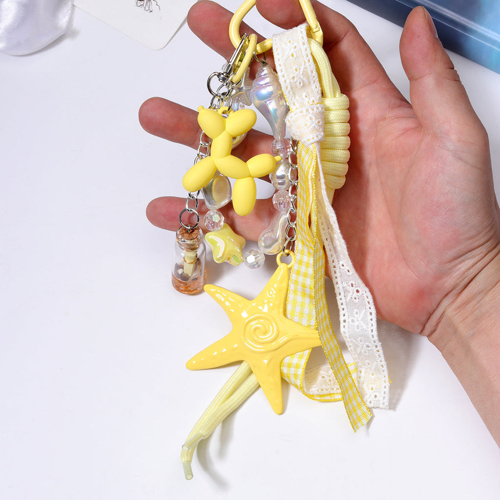 跨境货源义乌现货diy包包串珠挂件批发miu系包挂绳子手机链配饰