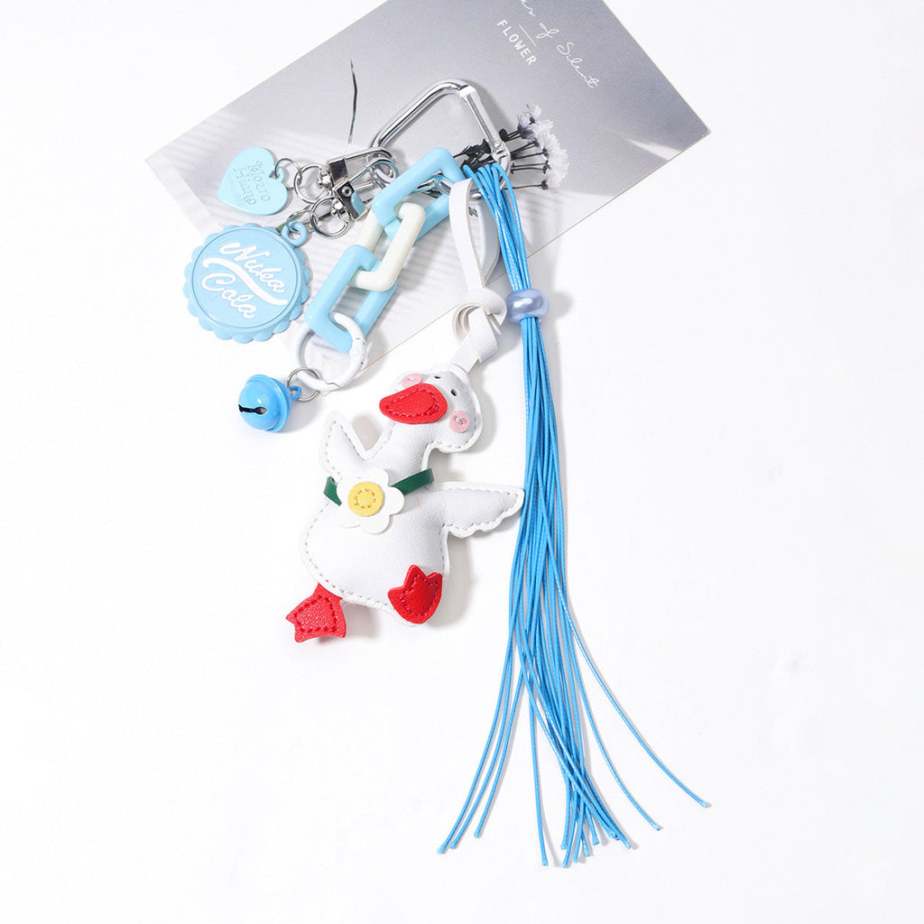 跨境热销爆款可爱呆萌PU皮革小鸭子包包挂件酒瓶盖金属铃铛挂饰