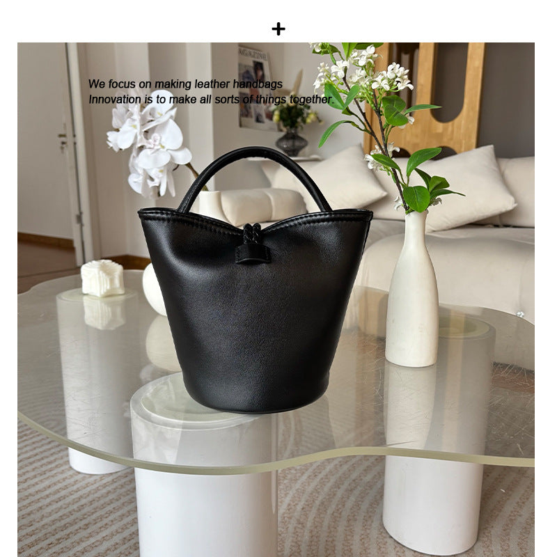 2025新款跨境编织绳结水桶包真皮手拎菜篮子包单肩斜挎小包包女