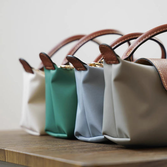 法国夏季新款mini尼龙饺子包单肩斜挎包迷你化妆包百搭手提手机包