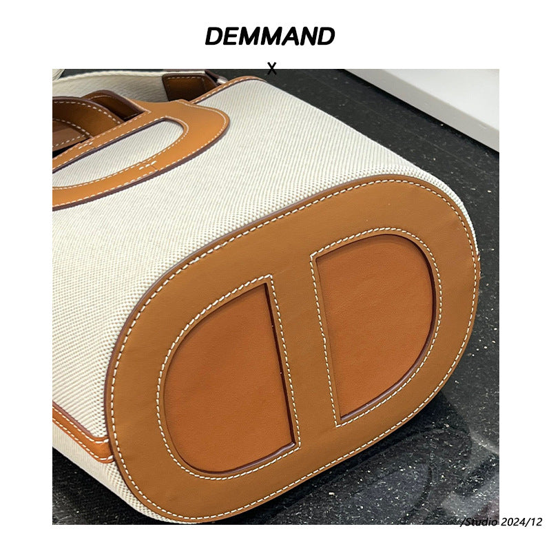 高级感猪鼻子包包大容量女包2024新款真皮小众水桶包斜挎菜篮子包