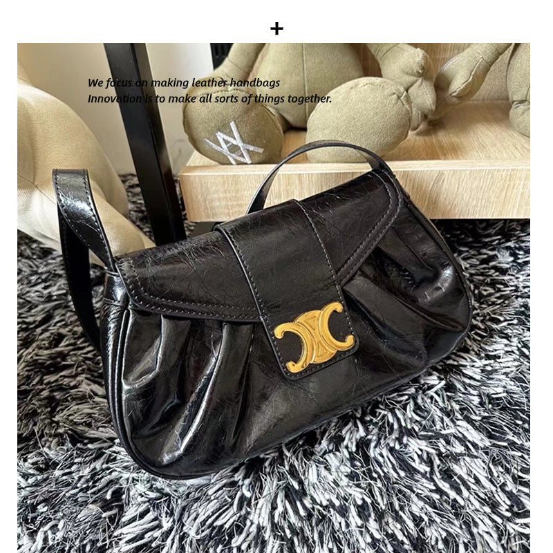 头层牛皮凯旋门真皮褶皱云朵包腋下包法棍包时尚百搭单肩手提包女