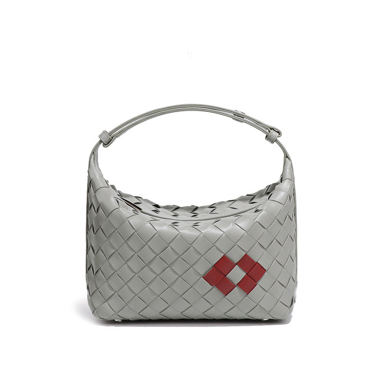 个性潮流简约手拎饭盒包新款红唇夏季单肩包手工编织包包腋下女包