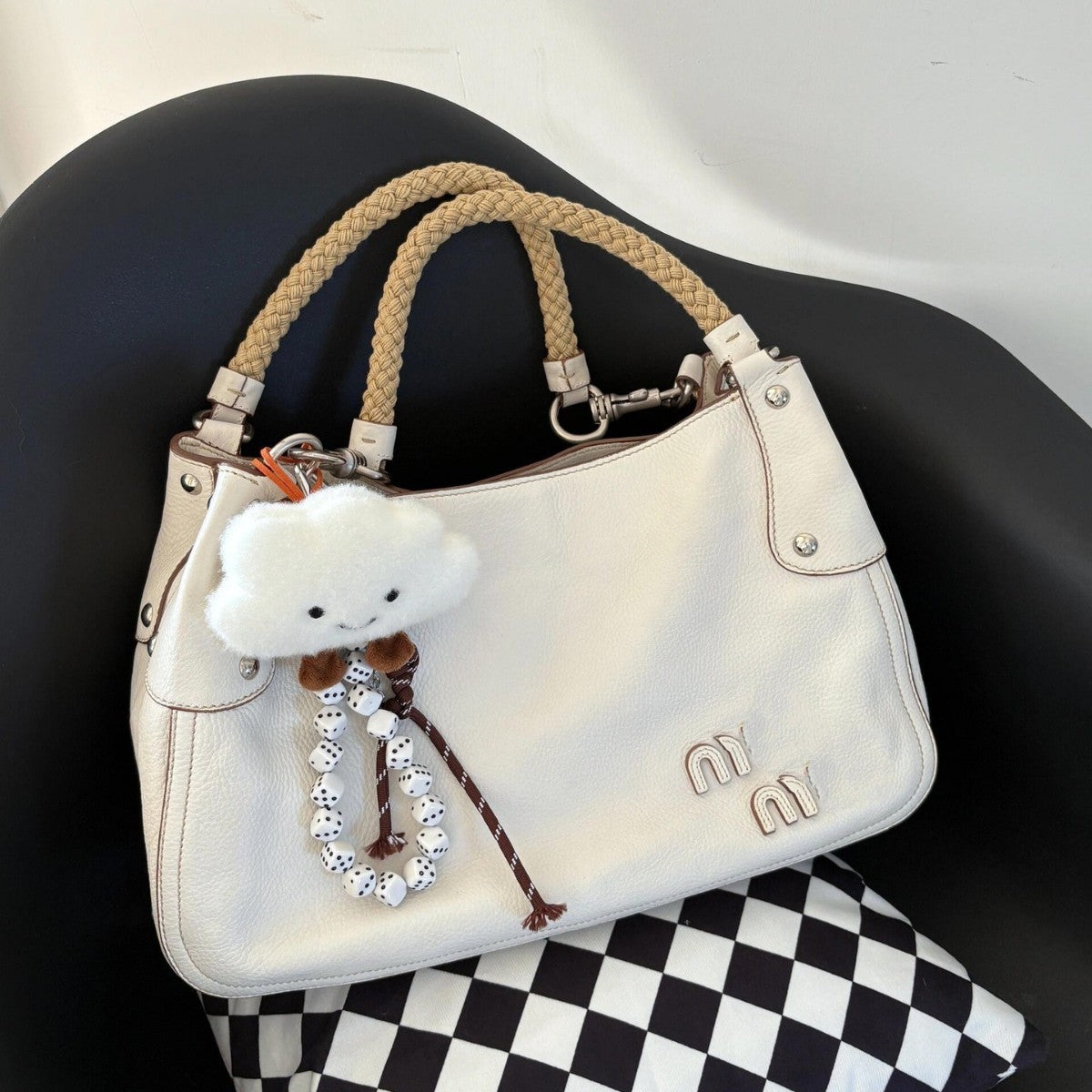 miu廖轻奢小众高级感腋下包2025新款夏季麻花手提单肩斜挎包女