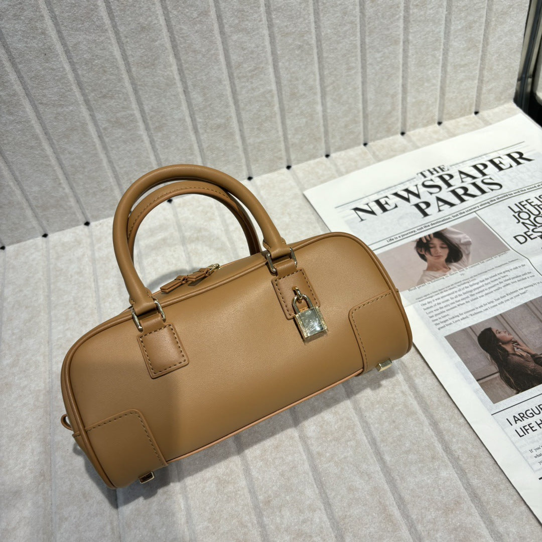 婉云质感真皮2025新款单肩斜挎包迷你复古手提保龄球包小众设计