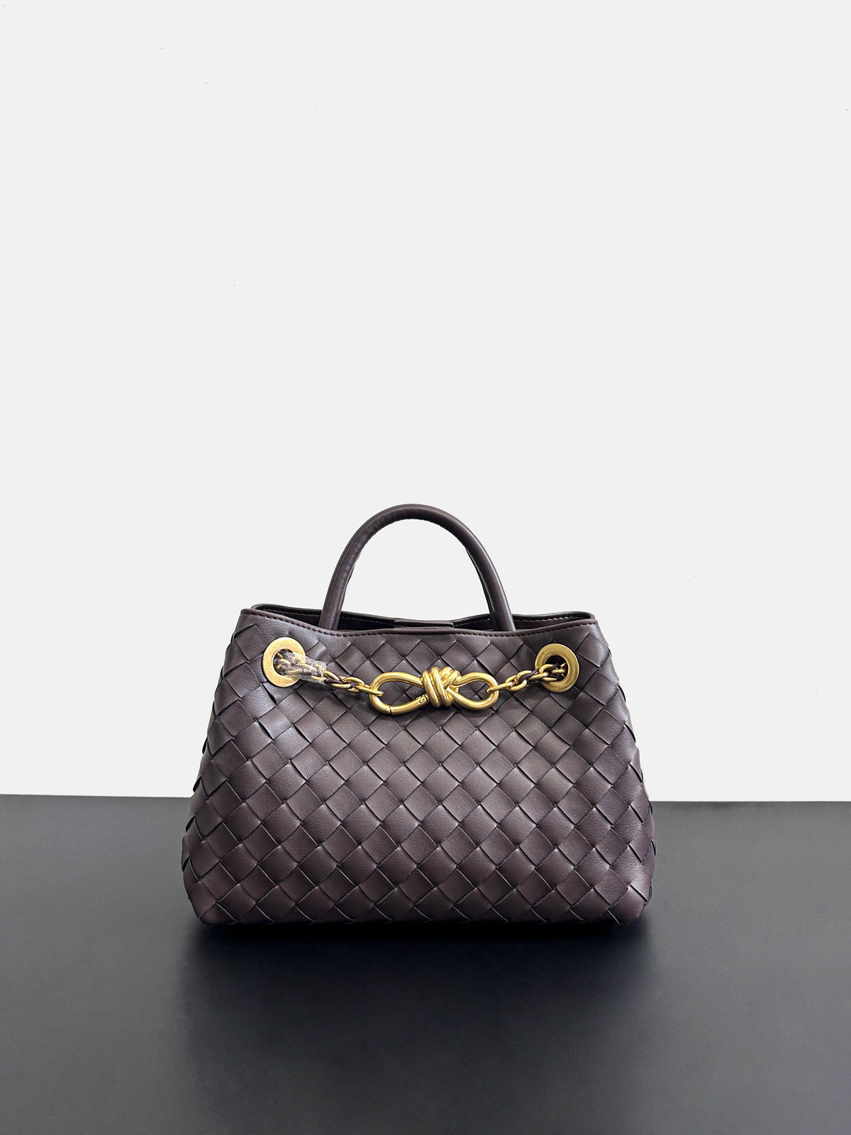 2024夏季新款编织蝴蝶结大容量真皮双肩女包单肩斜跨手提包