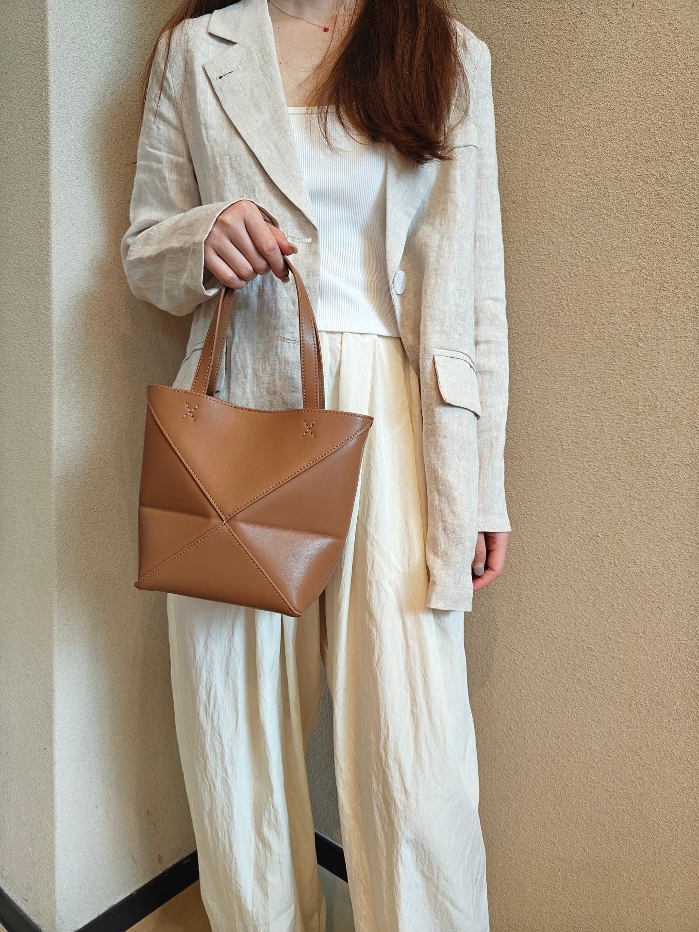 2024新款真皮女包变形几何拼接折叠托特单肩斜跨潮流双肩厂家