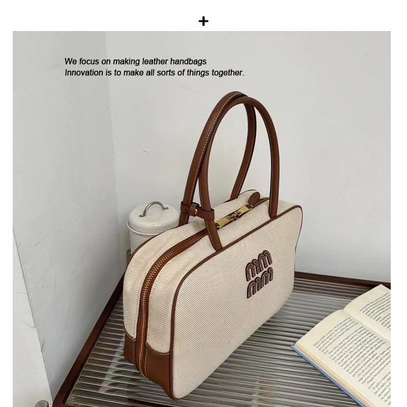 大容量手提包包女春夏2024新款时尚上班通勤枕头包单肩斜挎帆布包