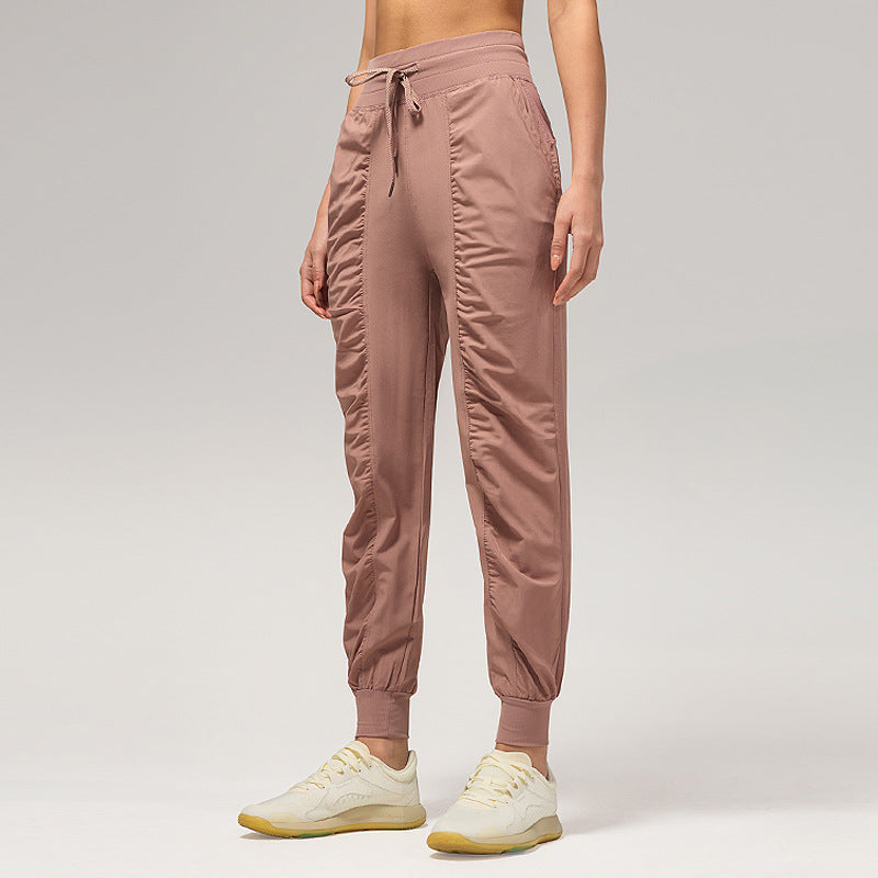 休闲宽松运动裤女压褶跑步瑜伽健身裤九分口袋速干透气束脚卫裤