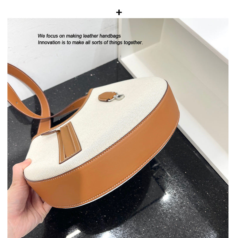 2024新款牛皮帆布包女单肩斜挎大容量马鞍包时尚简约通勤托特包