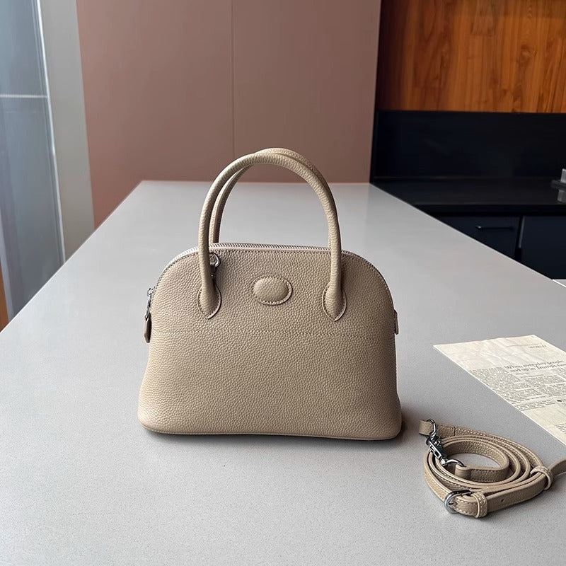 新款荔枝纹真皮贝壳包头层牛皮保龄球手提包拉链大容量通勤女包