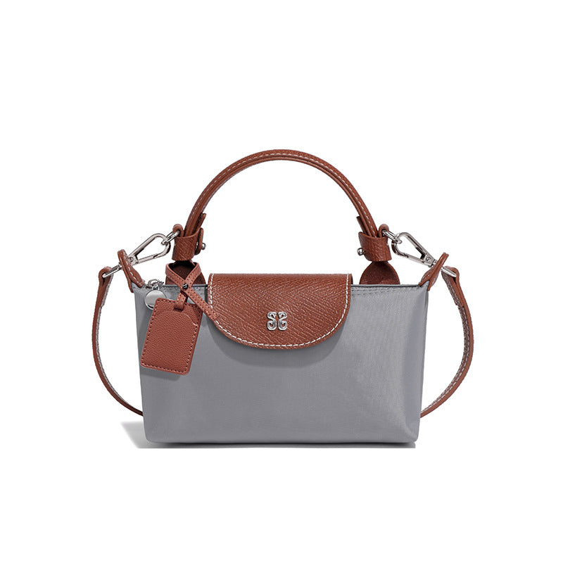 设计感女包百搭斜挎包小众迷你可爱饺子包时尚潮流拼色手提单肩包