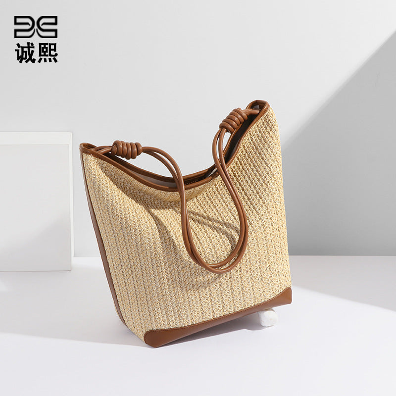 小众设计新款包包女简约拉菲草旅行海边草编包沙滩包单肩包托特包