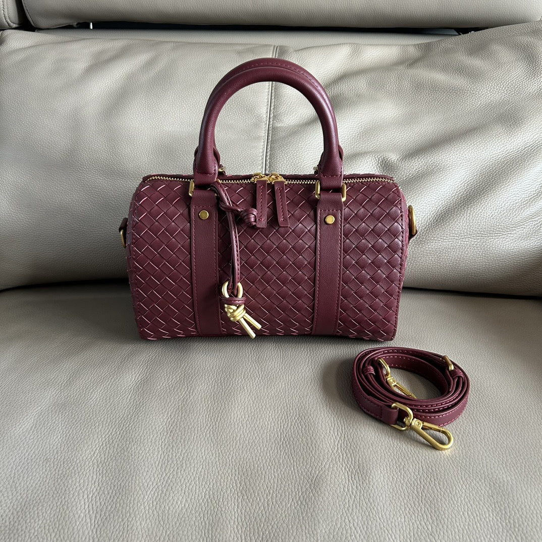 编织牛皮波士顿枕头包2024秋冬新款手工时尚通勤单肩斜挎包手提包