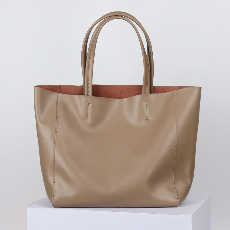 韩版大容量通勤包妈咪购物包牛皮简约真皮托特包单肩斜跨笔记本包