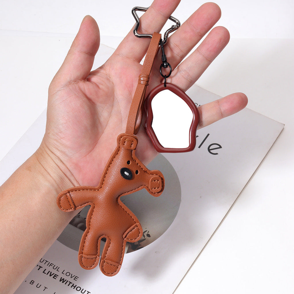 跨境热销包包挂件现货代发PU皮革歪脖子小熊挂件亚克力镜子包挂