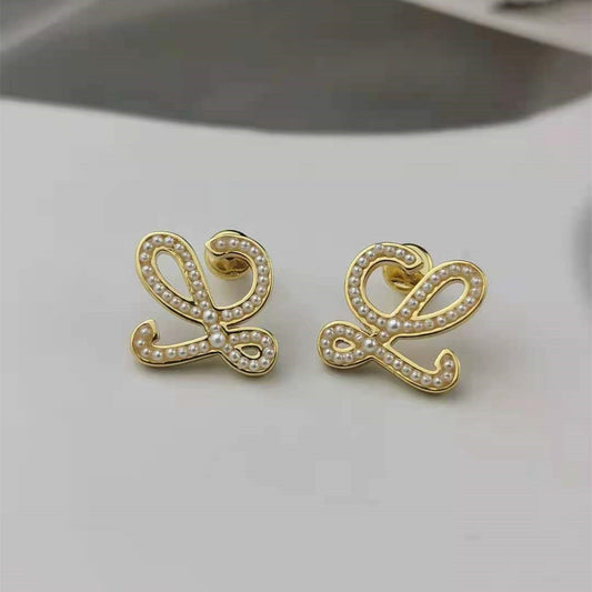 罗家新款几何抽象珍珠耳钉高级感时尚气质厂家批发高版小米珠耳环