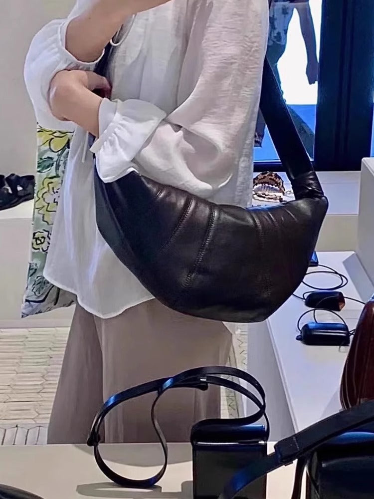 L家牛角包小众羊皮可颂包休闲饺子包真皮小号斜挎流浪胸包 批发