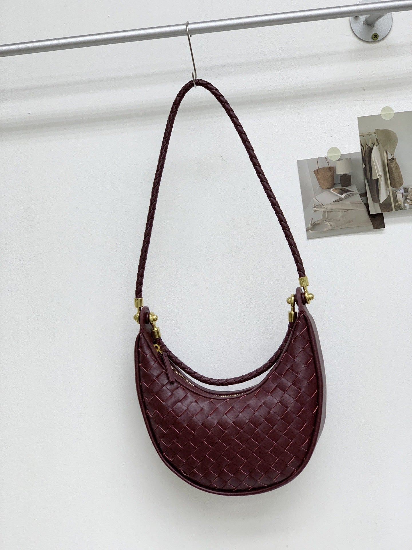 网红爆款编织纹真皮腋下包女百搭2025春季新款牛皮单肩斜跨饺子包