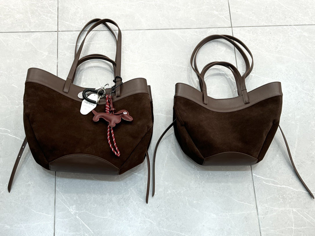 磨砂真皮菜篮子包水桶包包女高级感小众手提包麂皮绒斜挎包锦囊包