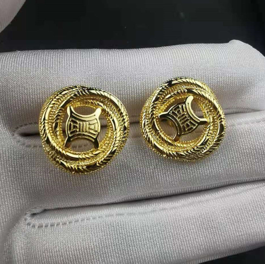 赛家新款凯旋门耳环简约时尚个性气质ins风线条缠绕形耳钉