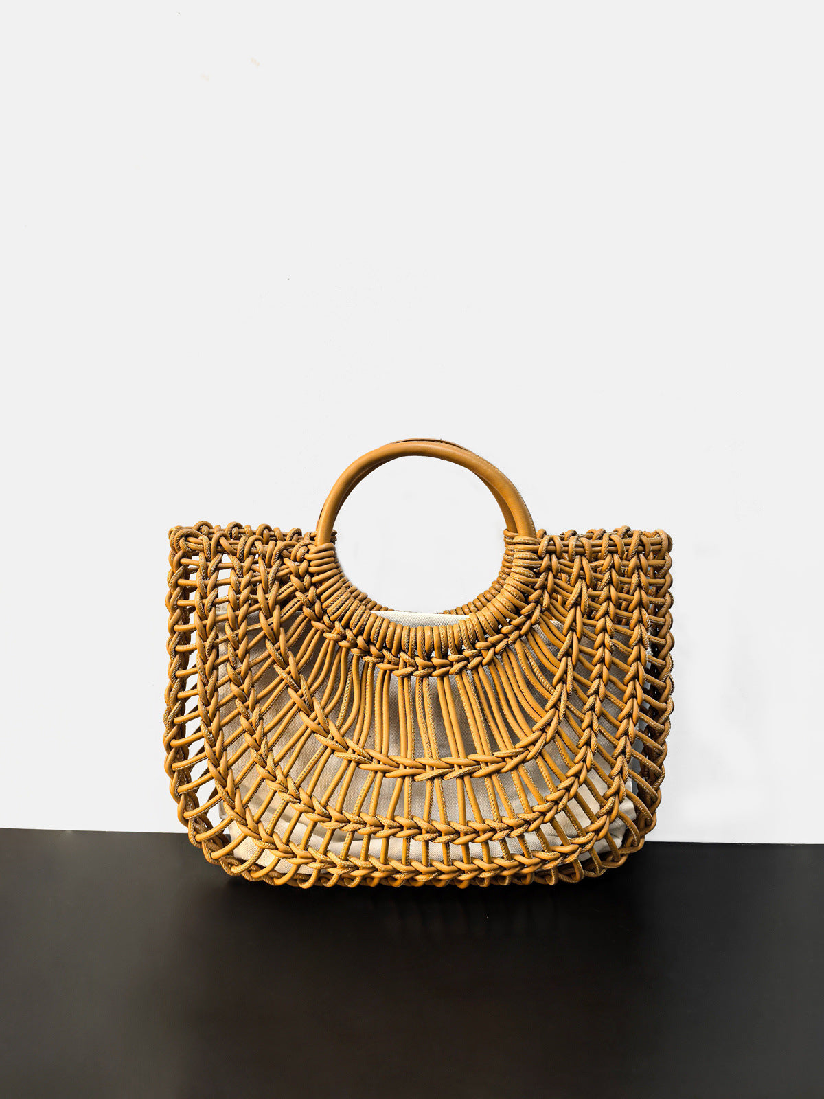 2025新款时尚百搭草编镂空出街休闲夏日度假风女式手提编镂空包包