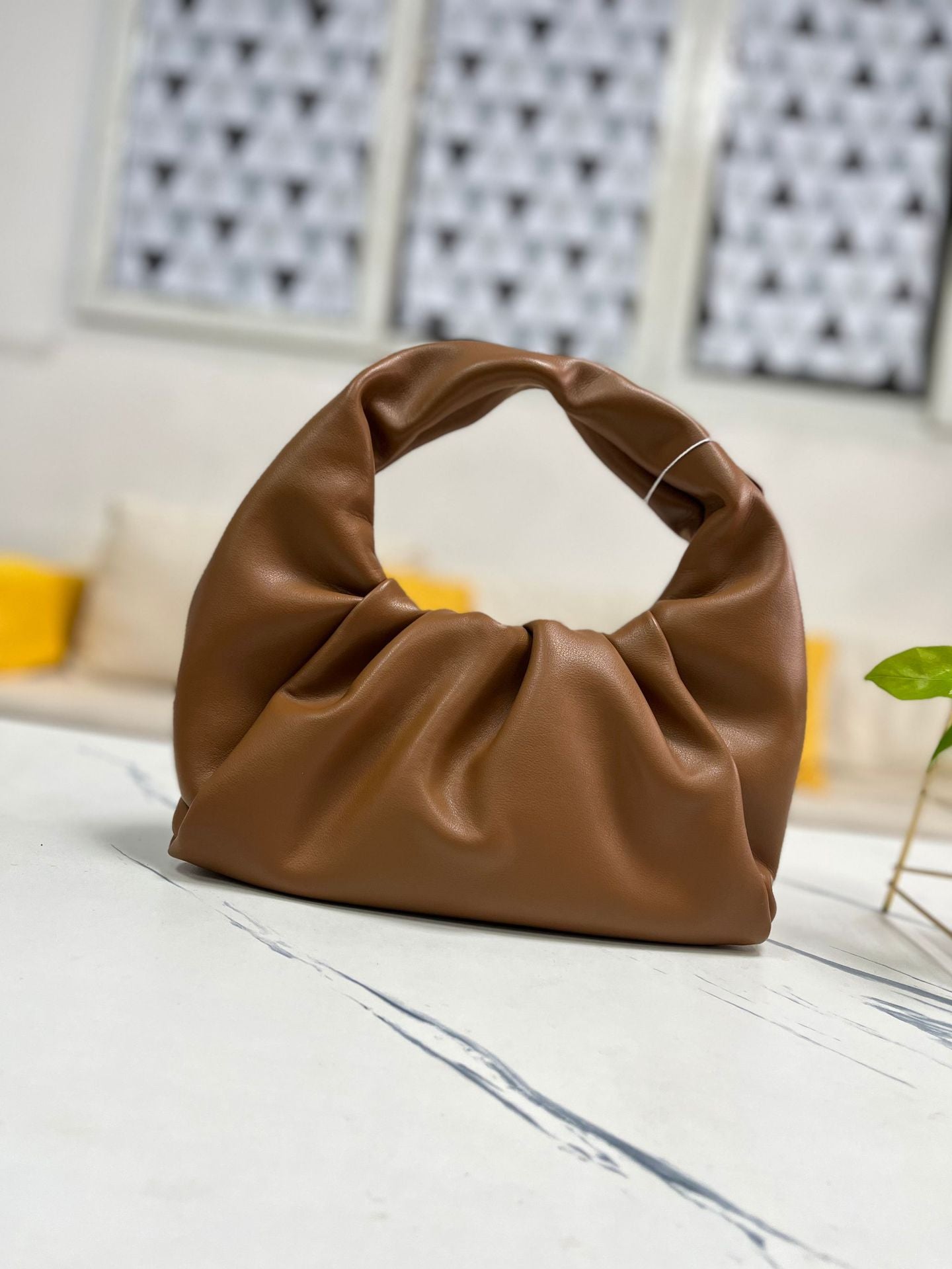 包包女2022新款女包牛角包pouch云朵包饺子包手提单肩包真皮女包