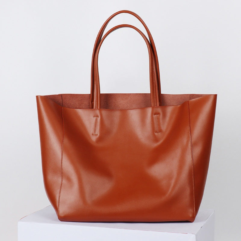 韩版大容量通勤包妈咪购物包牛皮简约真皮托特包单肩斜跨笔记本包