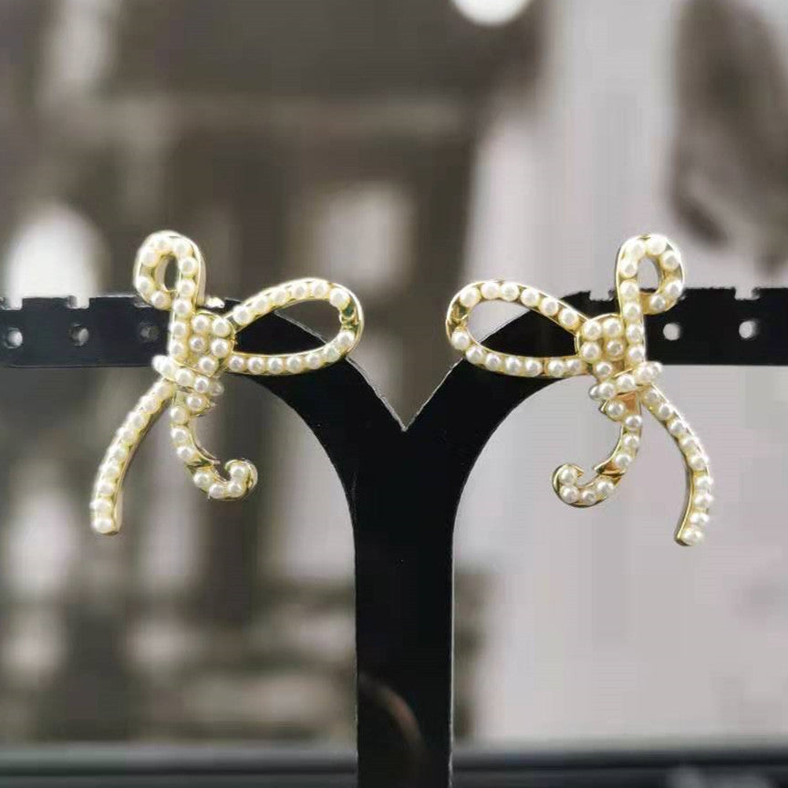 赛家新款耳钉女珍珠蝴蝶结精致INS风法式耳饰不规则蝴蝶结耳钉