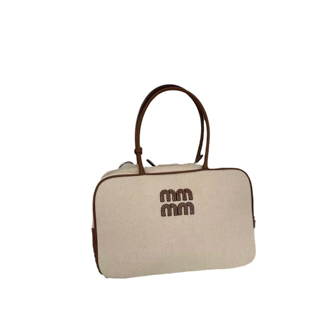 大容量手提包包女春夏2024新款时尚上班通勤枕头包单肩斜挎帆布包