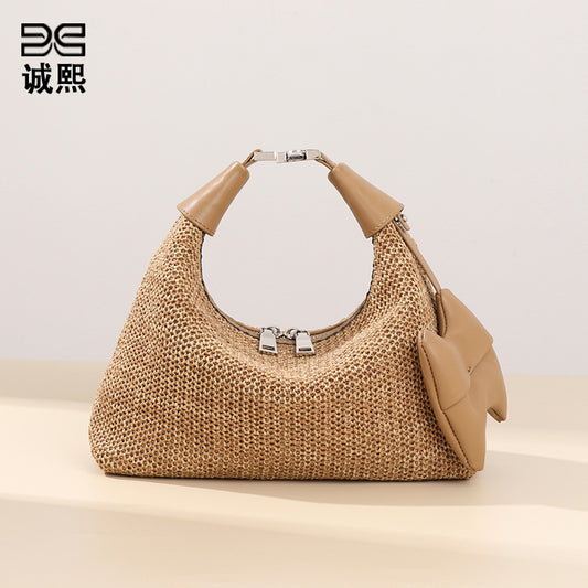 海边夏日新款拉菲草手拎饭盒包休闲百搭单肩腋下包时尚草编饺子包