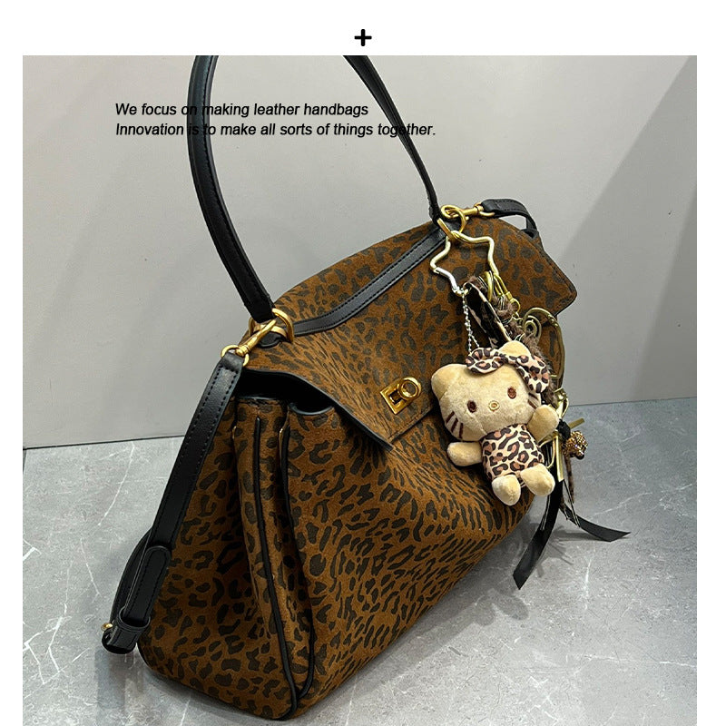 2024秋冬新款时尚通勤马毛羽毛包豹纹腋下单肩包百搭手提斜挎包女