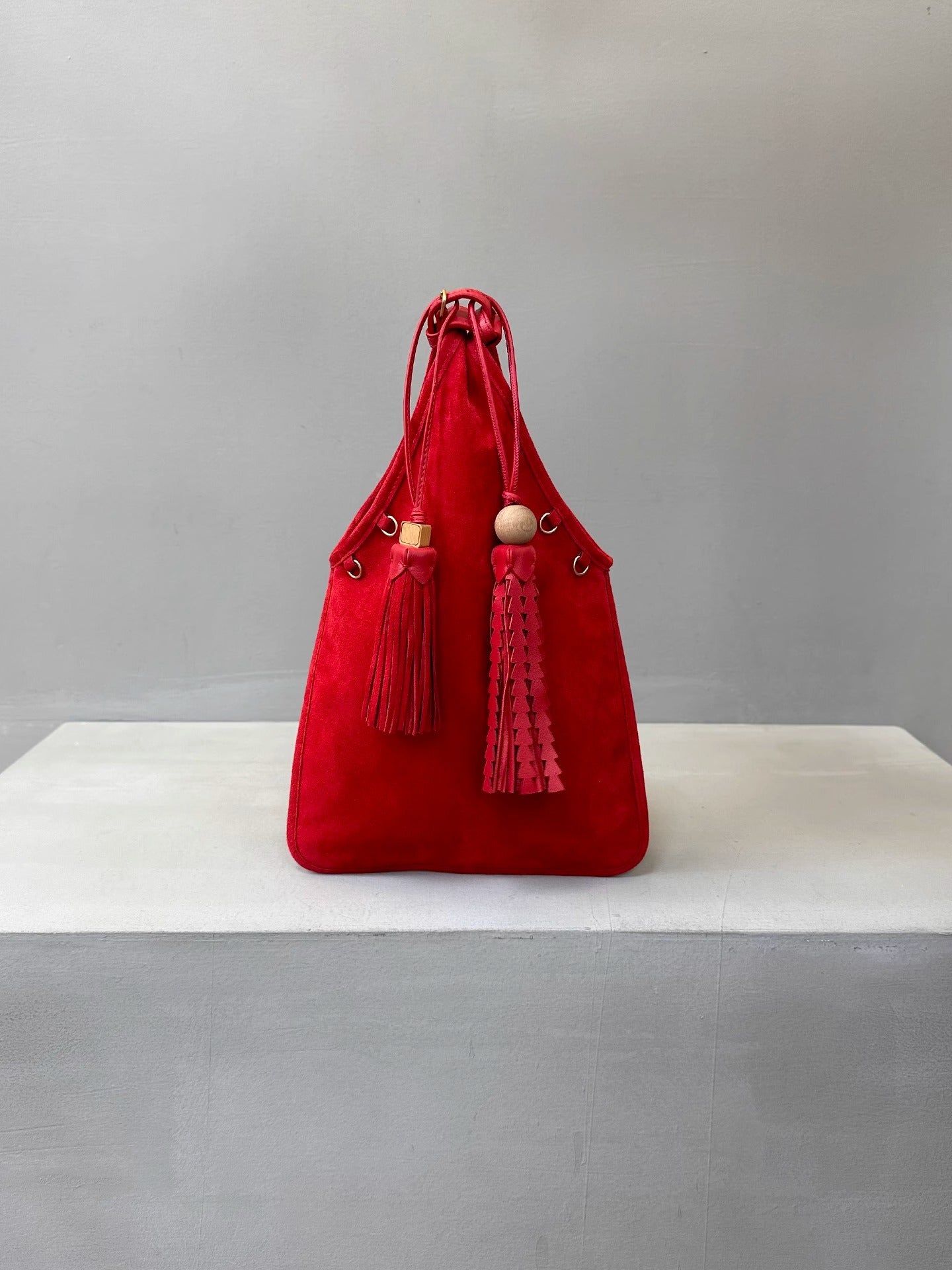 繆家2025新款麂皮流苏腋下包翻毛真皮复古手提包女玩偶挂件手拎包