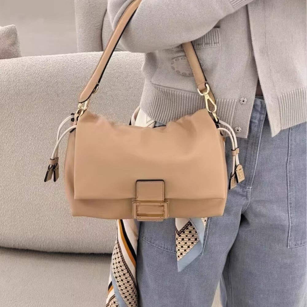 25新款法棍复古时髦抽绳腋下包轻奢高级翻盖云朵包软牛皮单肩包