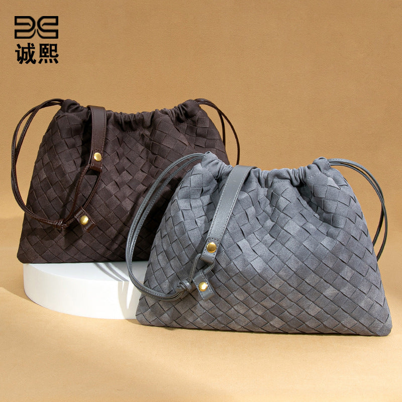 跨境爆款磨砂编织女包2025新款束口云朵包时尚小众单肩斜挎饺子包