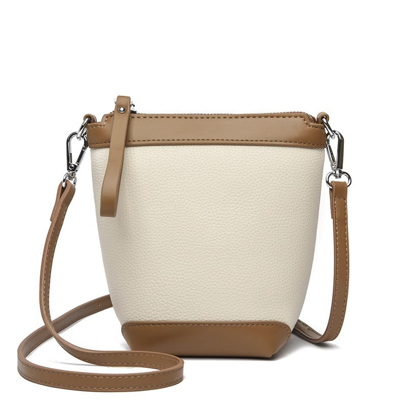 牛皮帆布拼接mini水桶包包女2023夏季单肩斜跨包韩版休闲手机包潮