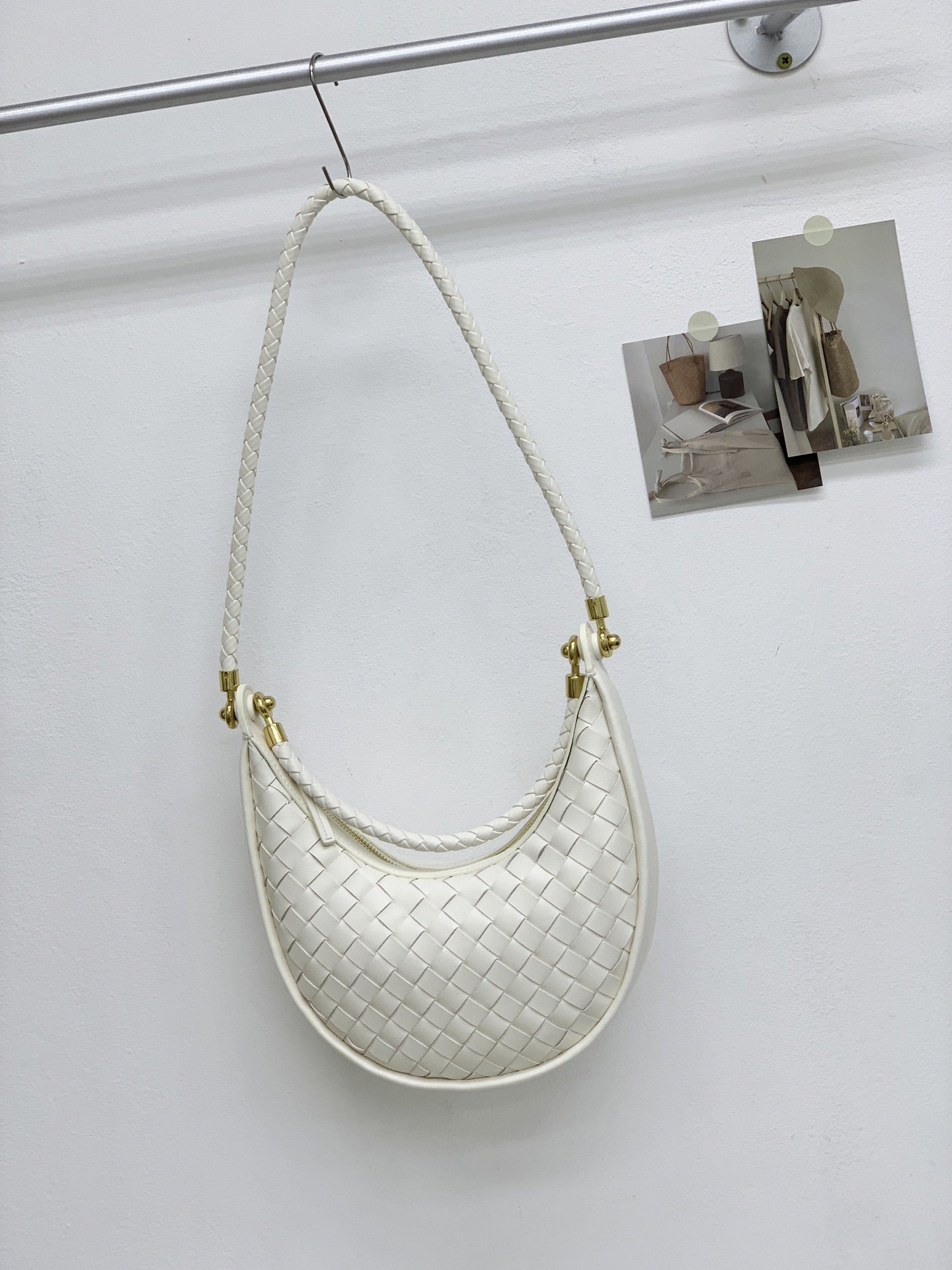 网红爆款编织纹真皮腋下包女百搭2025春季新款牛皮单肩斜跨饺子包