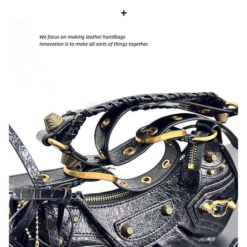 真皮包包女2023新款单肩轻奢月牙包法式腋下包甜酷辣妹机车包个性