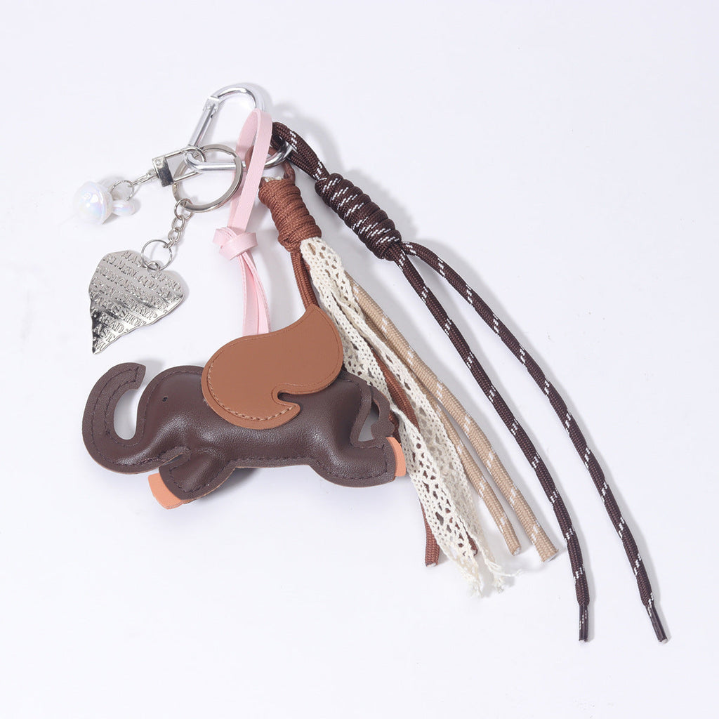 爆款包挂义乌现货diy包包小飞象PU包挂miu系包挂绳子手机链配饰