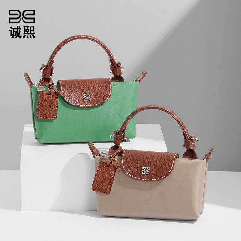 设计感女包百搭斜挎包小众迷你可爱饺子包时尚潮流拼色手提单肩包