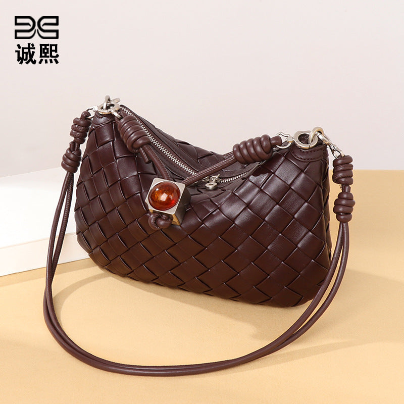 2025夏季新款手提手机包抽绳迷你小包包手工编织包女腋下包饺子包