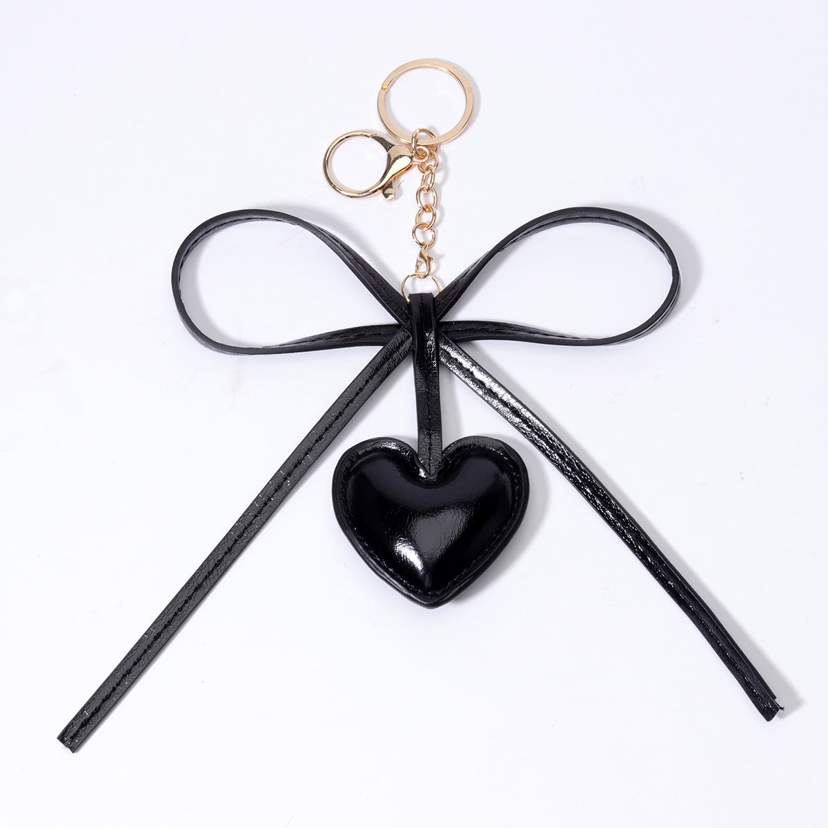 工厂批发定制时尚热销牛角包扣仿真皮挂饰挂件钥匙扣装饰品包包挂