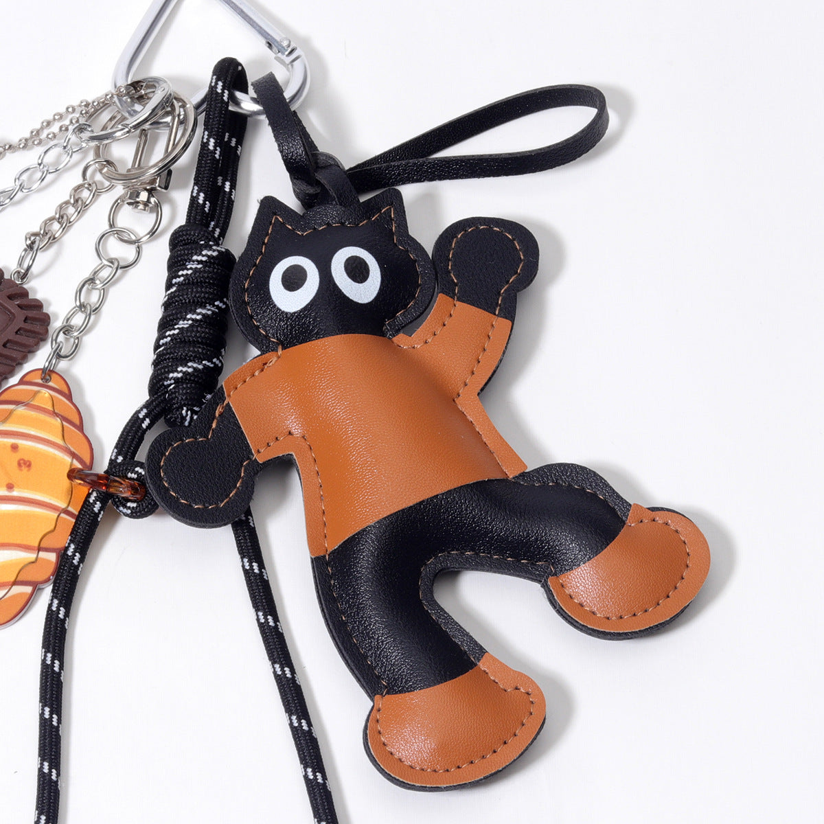 饰品工厂量大价优PU欢乐跳舞公仔爱心包挂包包挂件挂饰钥匙扣挂