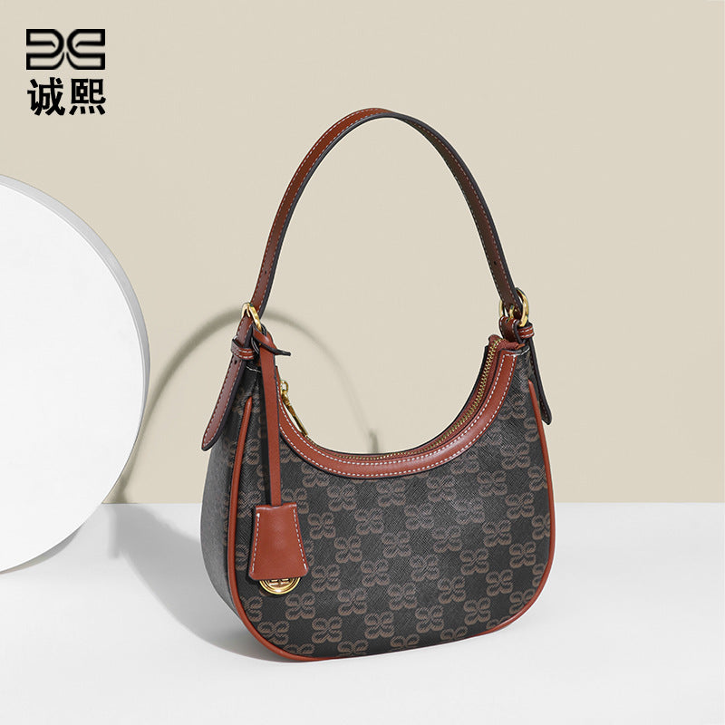 港风潮流老花月牙包百搭新月包小众设计手提包通勤单肩斜挎腋下包